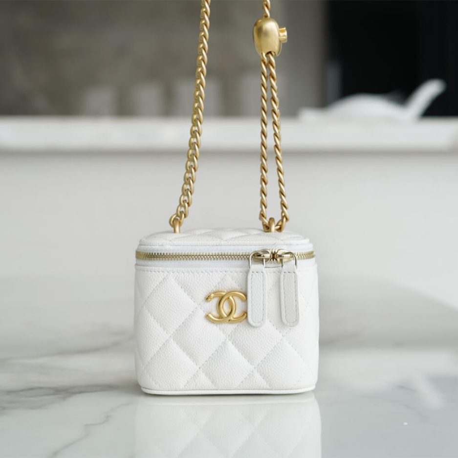 Ch*el small gold ball makeup bag