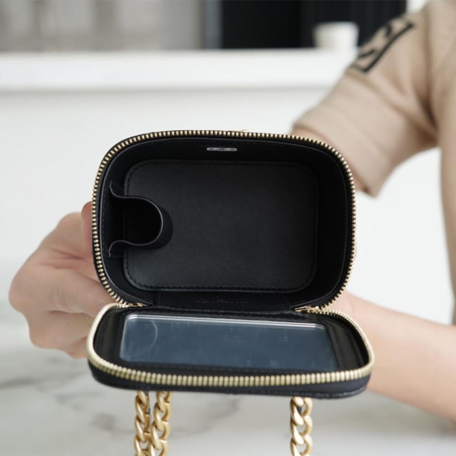 Ch*el small gold ball makeup bag